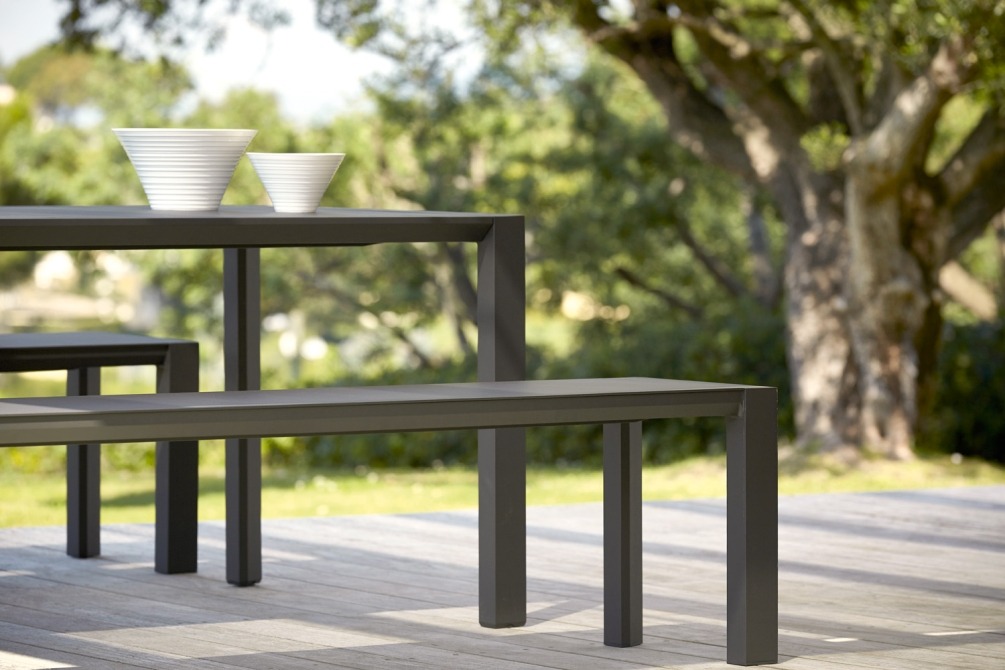 Metris dining table and benches on terrace