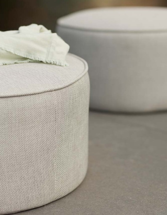 Outdoor round poufs on terrace