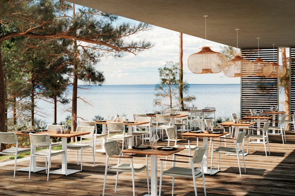 Alexa bistro tables with teak top on terrace of restaurant