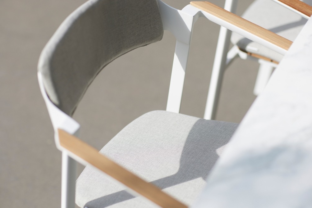 detail of cushion set on Icon dining armchair