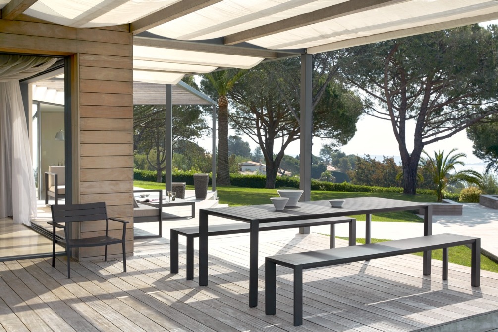 Metris dining table and benches on terrace