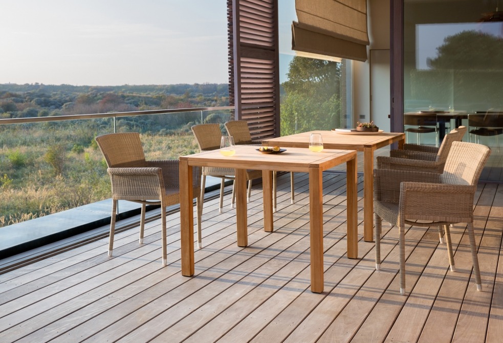 Natural teak dining table on terrace