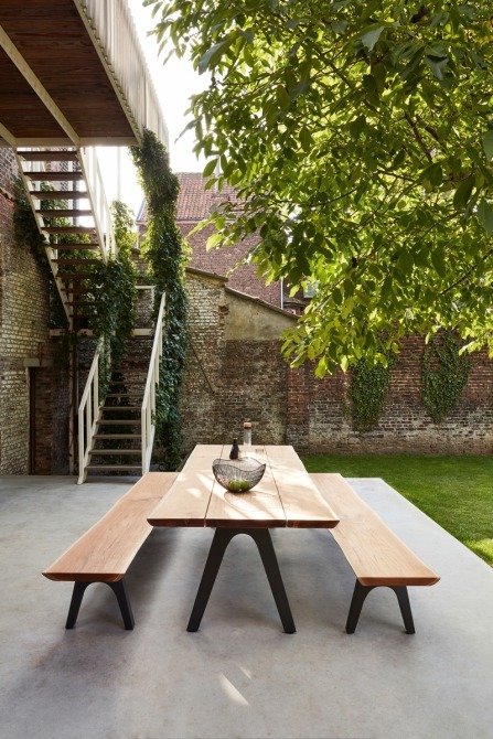 Pure dining table and bench on terrace