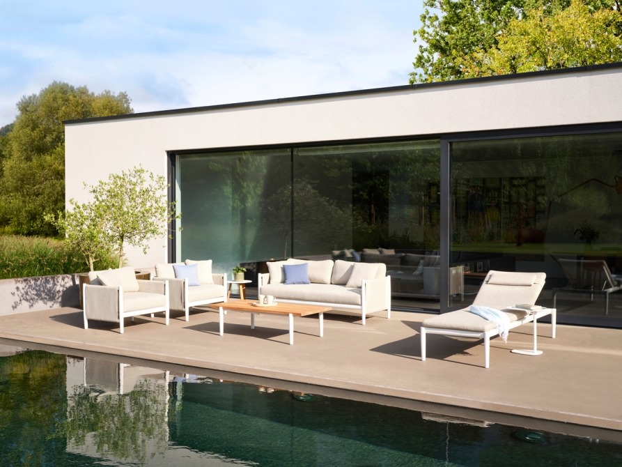 Switch Fabric sofa set and lounger on terrace by the pool